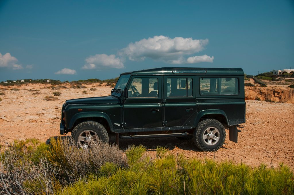 Self Drive Rwanda, Land Rover Defender in Rwanda, Green off-road vehicle,